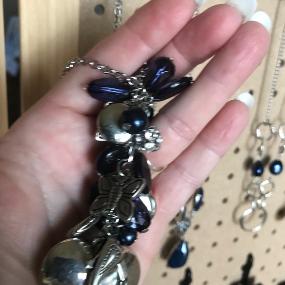 Long silver fidget w/dk blue & silver charms